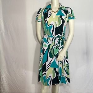 Retro Mid wrap dress by Tiana B. Multi colored greens in abstract pattern.